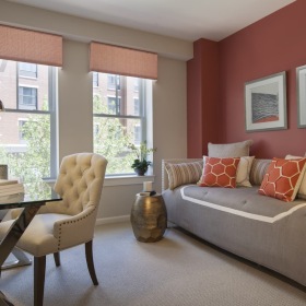 living area that includes ample seating spaces and bright lighting